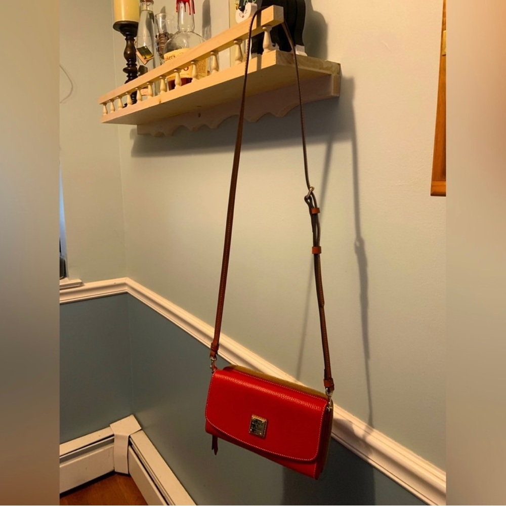 Never Used! Dooney & Bourke clutch.